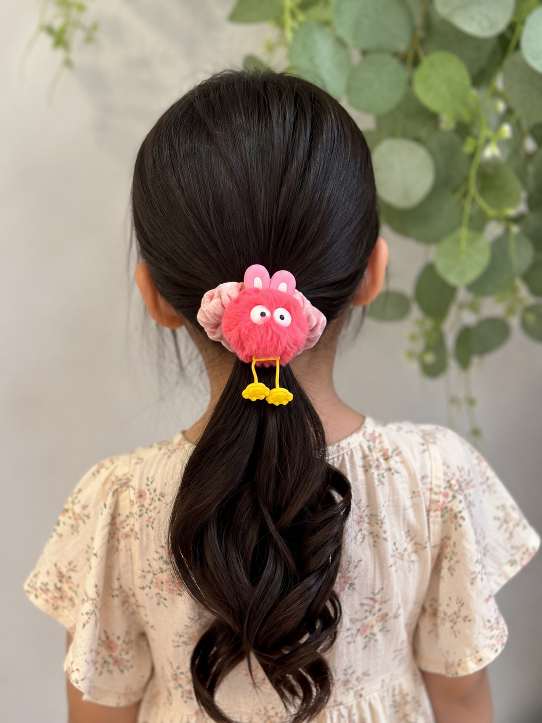 Plush monster scrunchie with eyes and feet