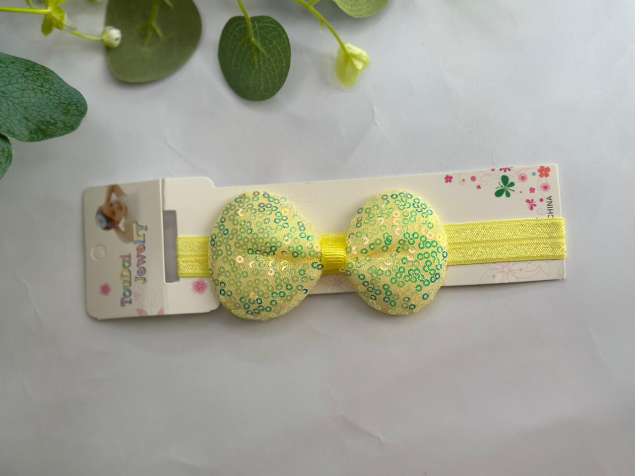 Shimmery sequin bow headband
