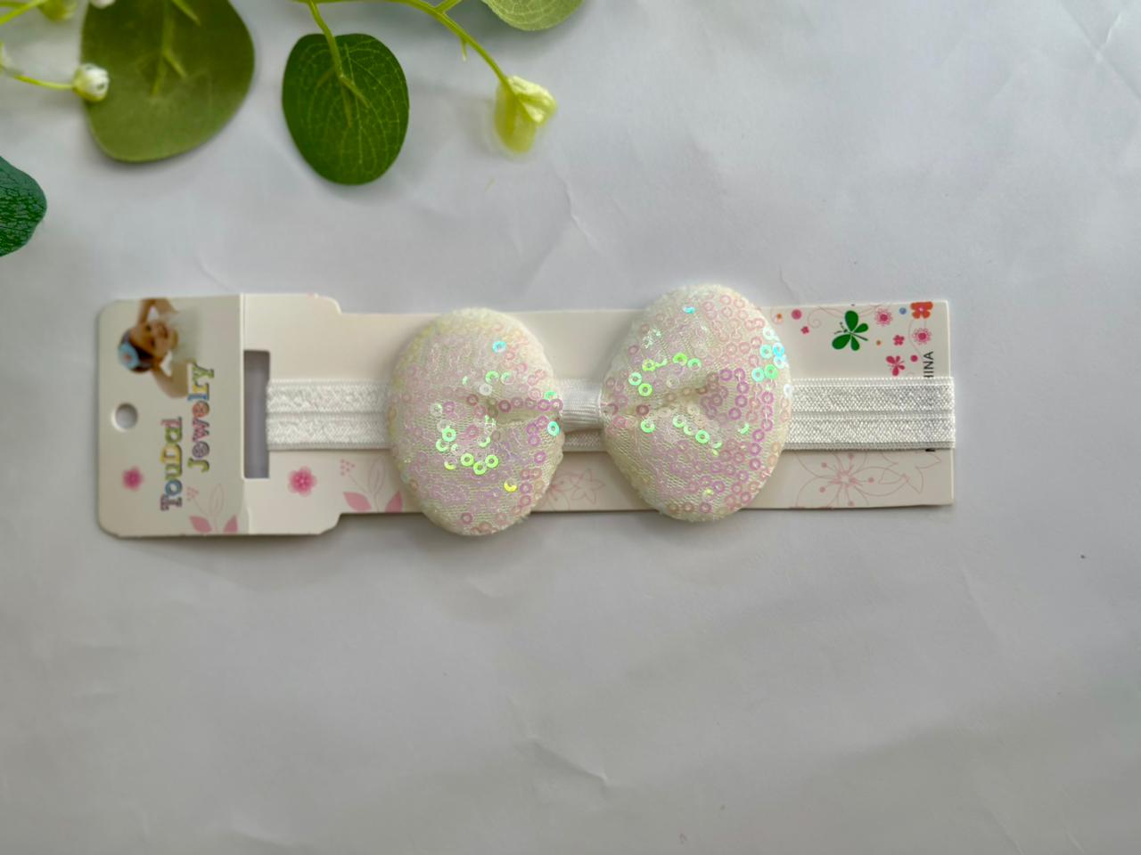 Shimmery sequin bow headband