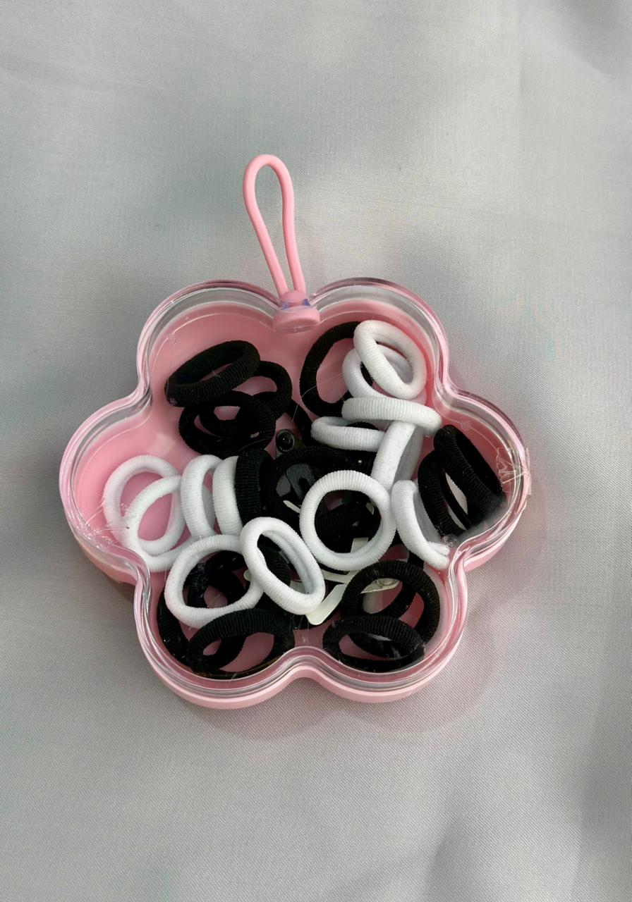 Hair ties in a flower box