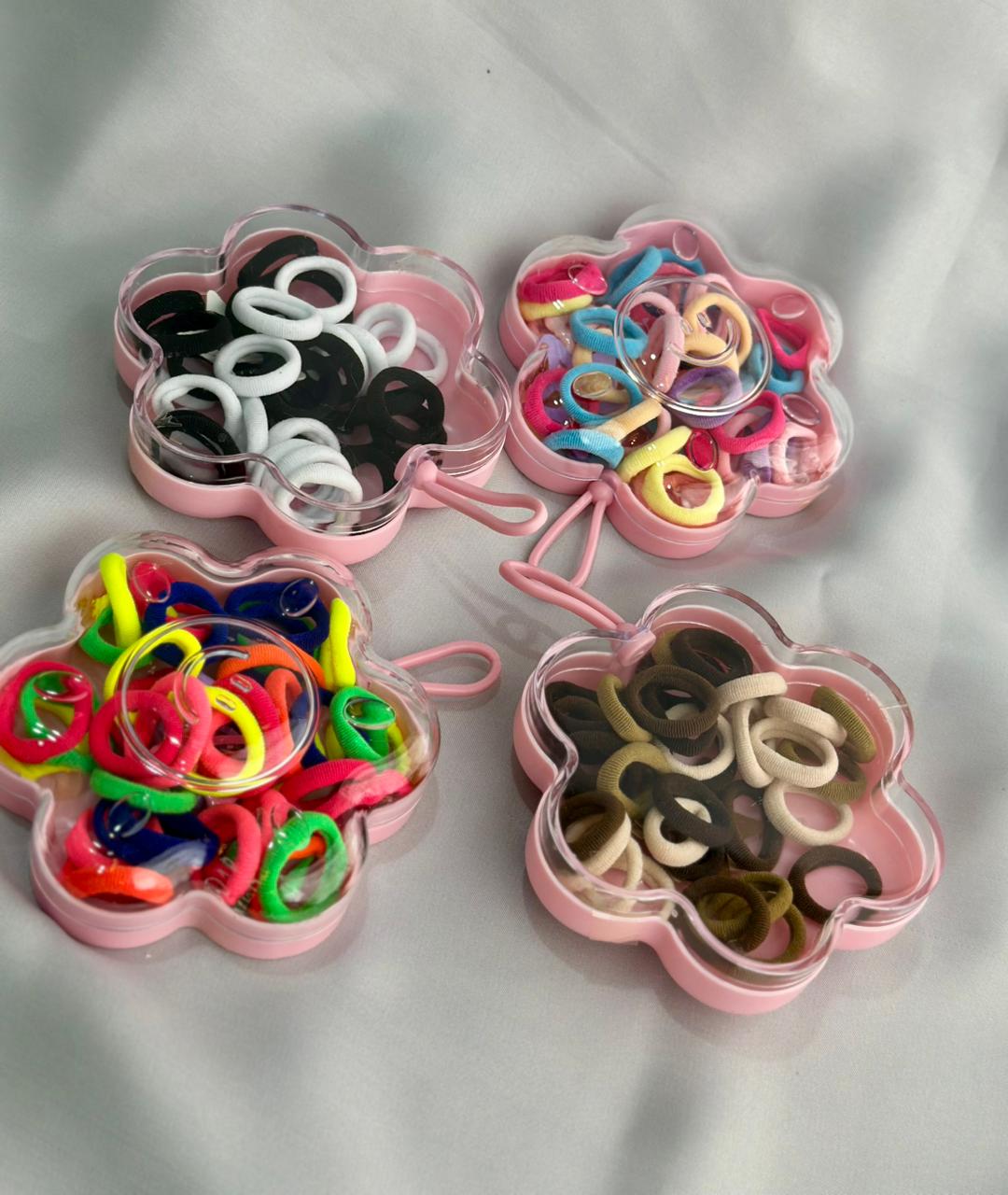 Hair ties in a flower box