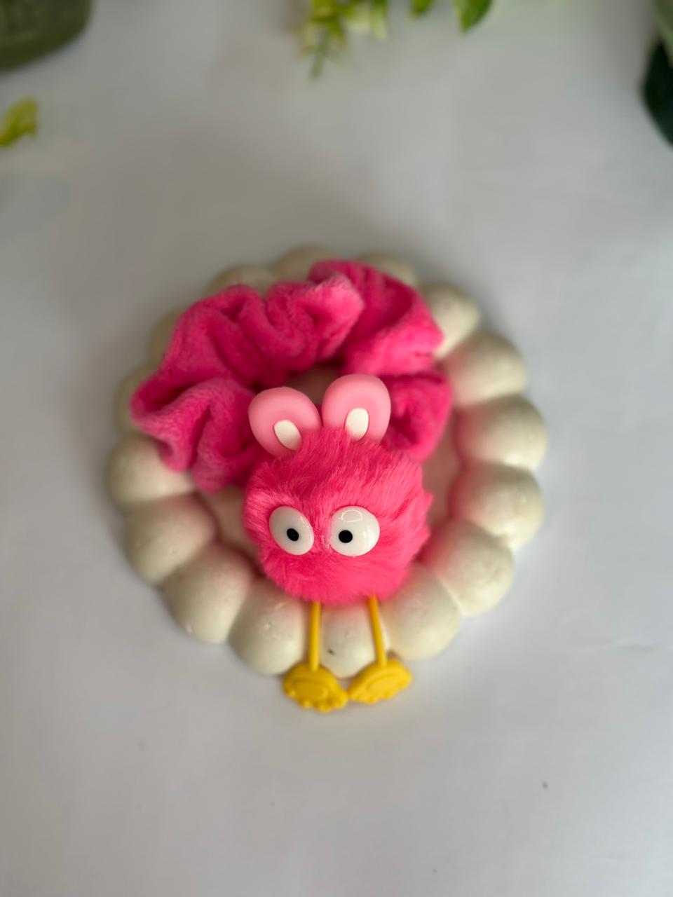 Plush monster scrunchie with eyes and feet