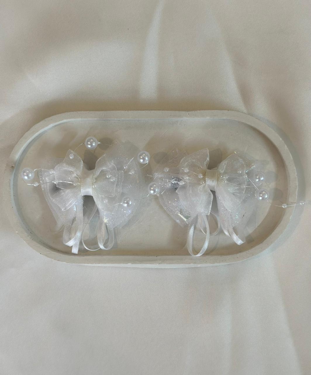 Bow ribbon clip with pearls